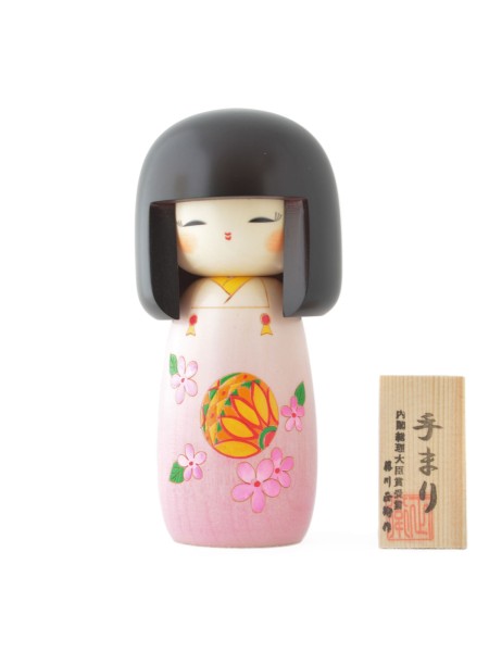 Kokeshi Temari raffigurante un gioco